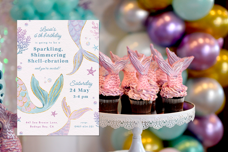 mermaid-birthday-invite-2 Mermaid-themed birthday invitation beside a display of pink mermaid-tail cupcakes on a white stand, with pastel balloons in the background, creating a whimsical underwater birthday party atmosphere.