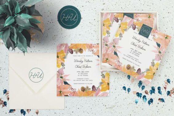Blog Post Cover: '15 Ideas for Using a Wedding Monogram (and How to Create Yours)'. Square invitations featuring a delicate flower design, neatly piled on a marble surface with small balloons and a flower pot.
