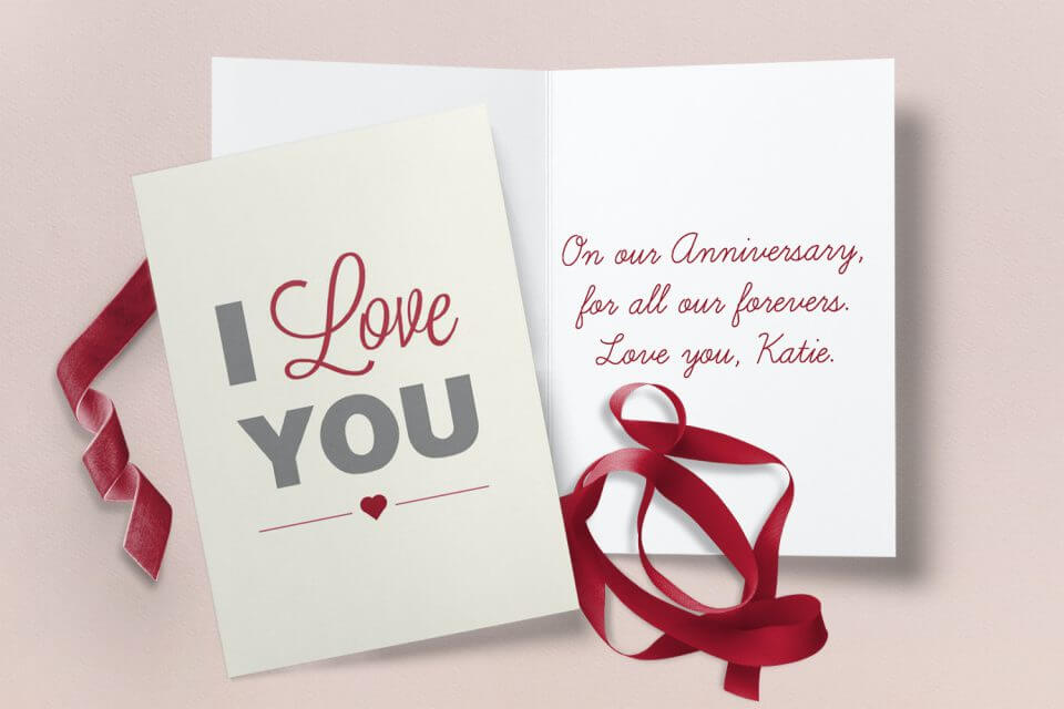 Share heartfelt wishes for a Happy Anniversary with a beautifully designed 'I Love You' card in shades of red, grey, and beige, capturing the essence of love and celebration