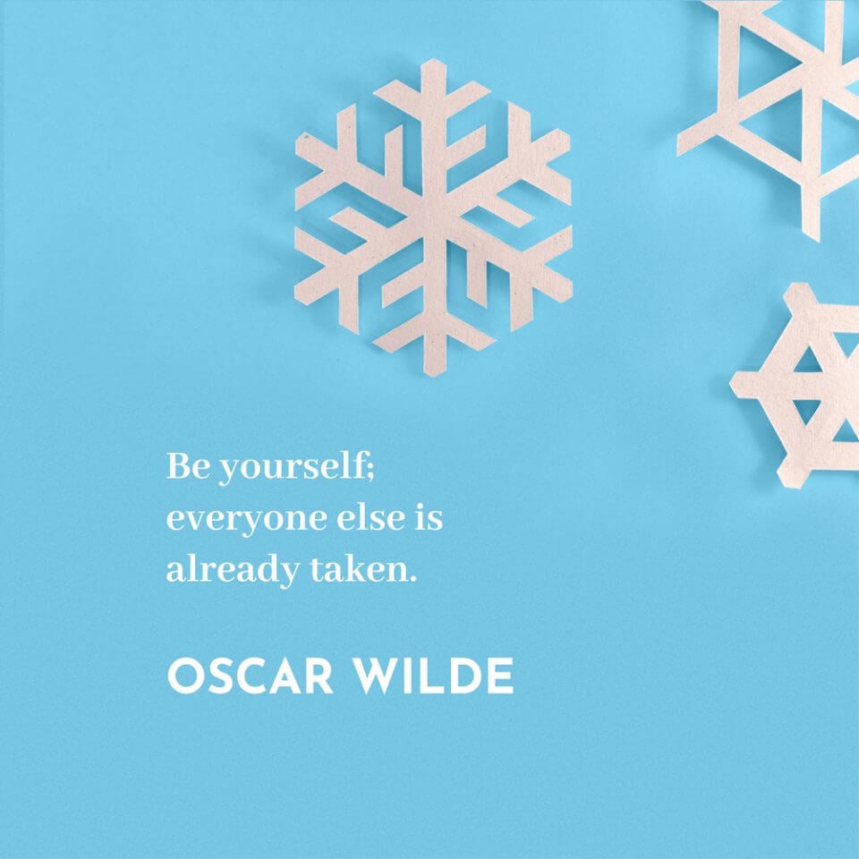 Oscar Wilde Quote: 'Be yourself; everyone else is already taken.' – Accompanied by a Background of Three Paper Snowflakes, Each with a Unique Design, Encouraging Individuality and Authenticity.