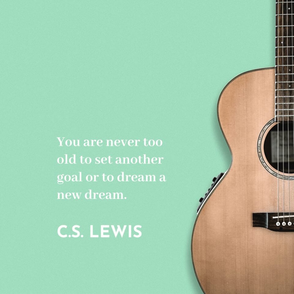 C.S. Lewis Quote: 'You are never too old to set another goal or to dream a new dream.' – Accompanied by a Background of a Guitar, Inspiring a Lifelong Passion for New Adventures.