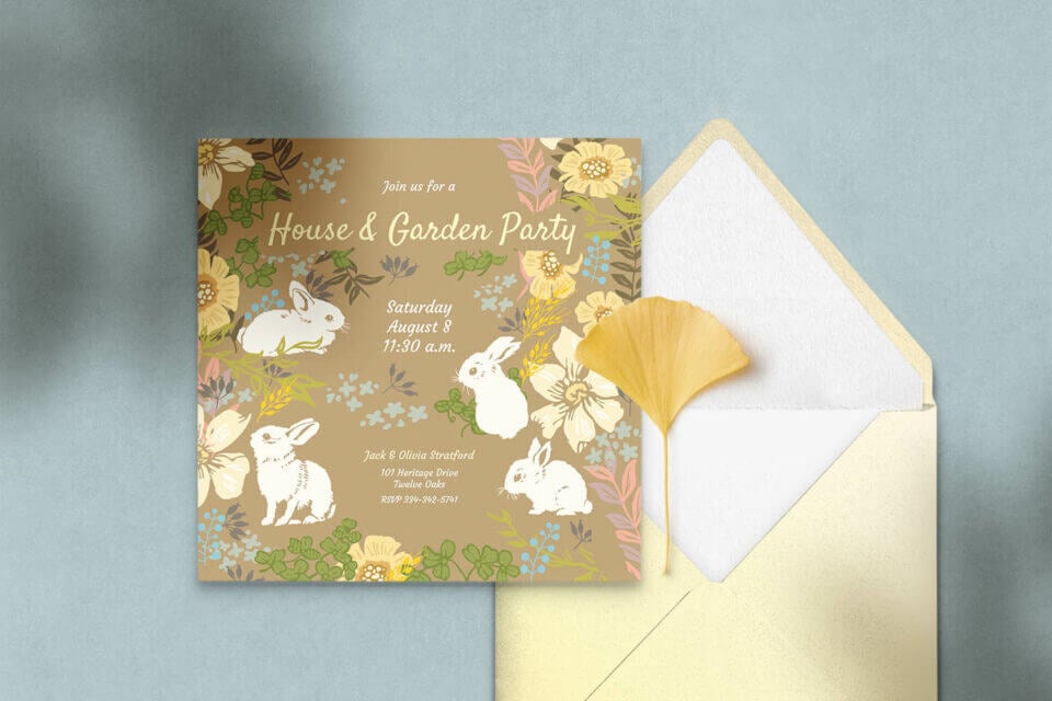 Whimsical Bunny and Flowers Spring Party Invitation: An enchanting illustration brings this invitation to life, showcasing adorable bunnies frolicking outside amid a backdrop of blooming flowers. A charming scene that sets the tone for a delightful springtime celebration.