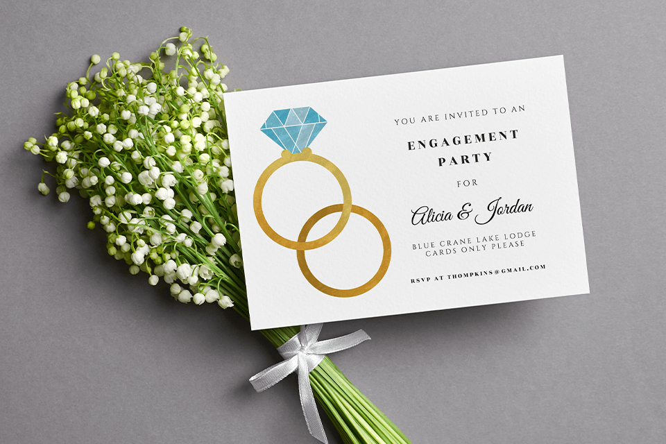 An elegantly simple engagement party invitation featuring two intertwined rings, symbolizing love and commitment.