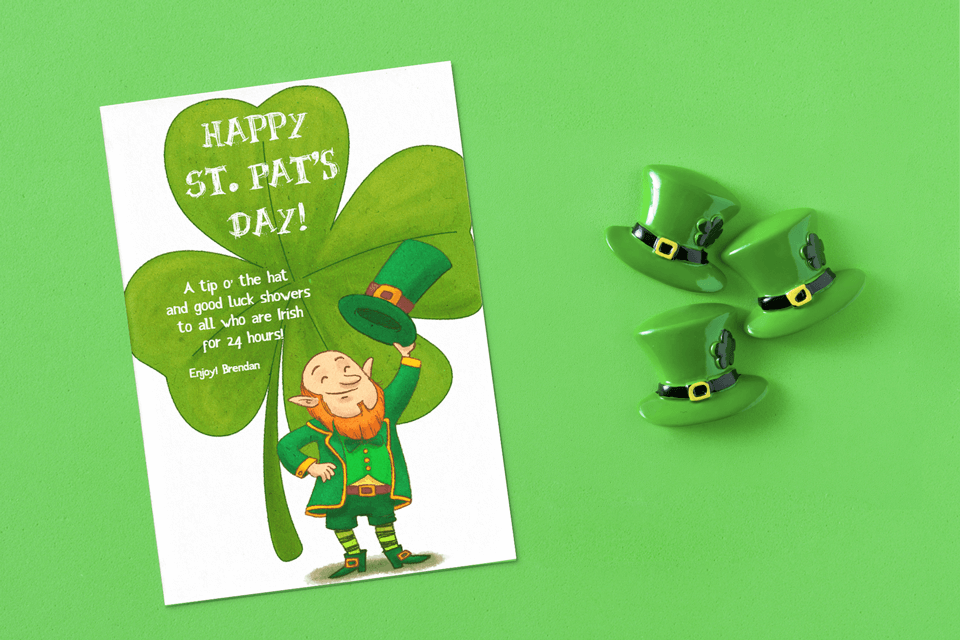 St. Patrick's Day greeting card sitting on a background with three leprechaun hats 