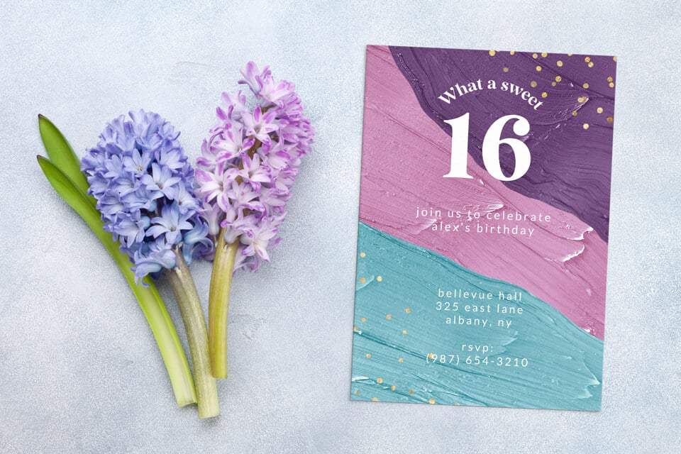Pastel-themed Sweet 16 birthday invitation set against a backdrop of soft hues, accented with two delicate purple flowers.