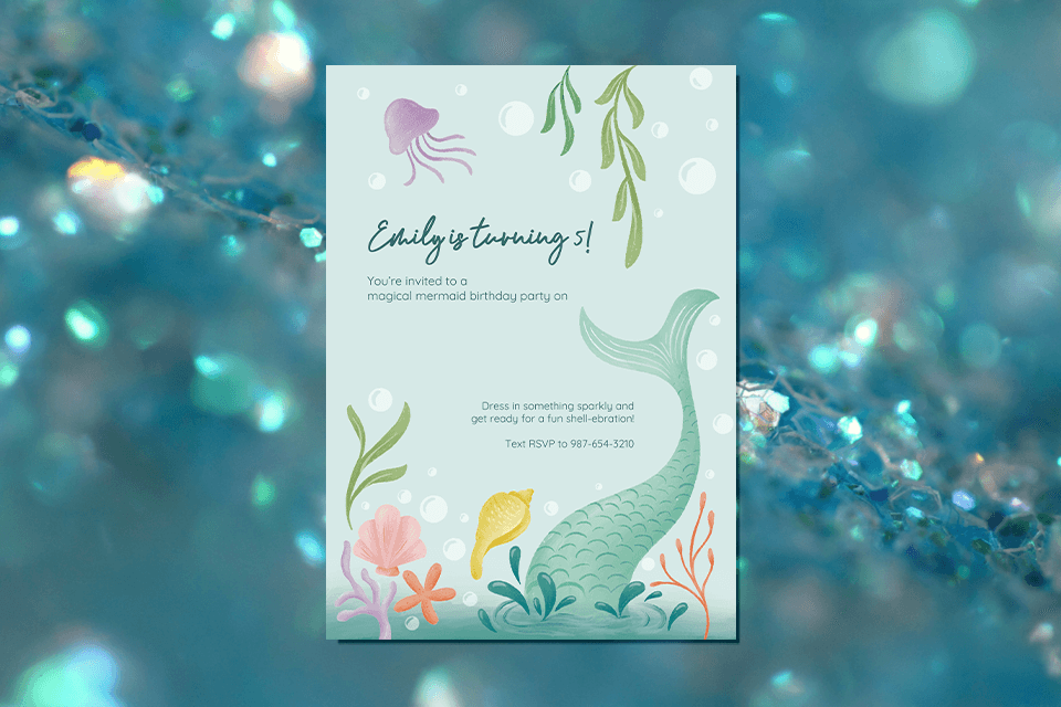 Mermaid-themed invitation by Gia Graham, with a light green background, green-tailed mermaid, sea plants, and purple jellyfish, on sparkly green sequins.