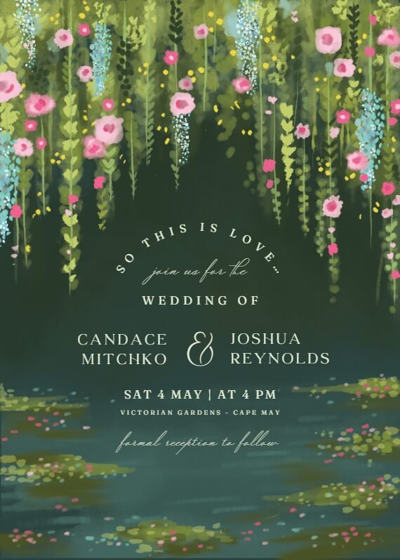 A wedding invitation with a dreamy illustration of hanging, colorful flowers set against a dark green background. The design, rendered in a watercolor style, is complemented by light-colored text that elegantly stands out.