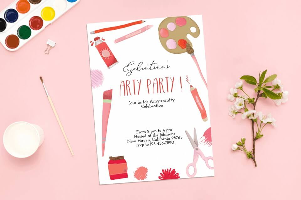 Galentine's Day Art Party Invitation with a Sip and Paint theme, featuring painting essentials such as brushes, a colorful palette, and vibrant watercolors, set against a pink background adorned with a lovely branch of flowers.