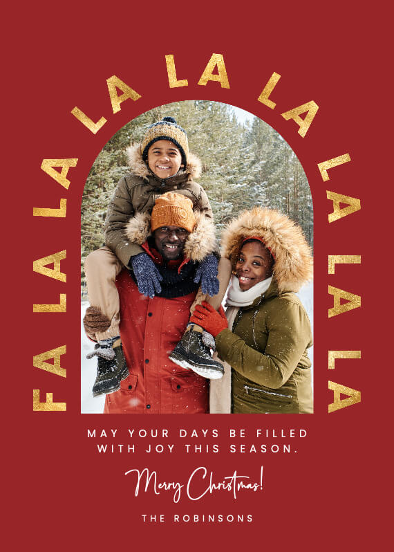 Festive Christmas card adorned with "Fa La La La La" in a golf foil-effect text encircling a heartwarming family portrait, set against a vibrant red background
